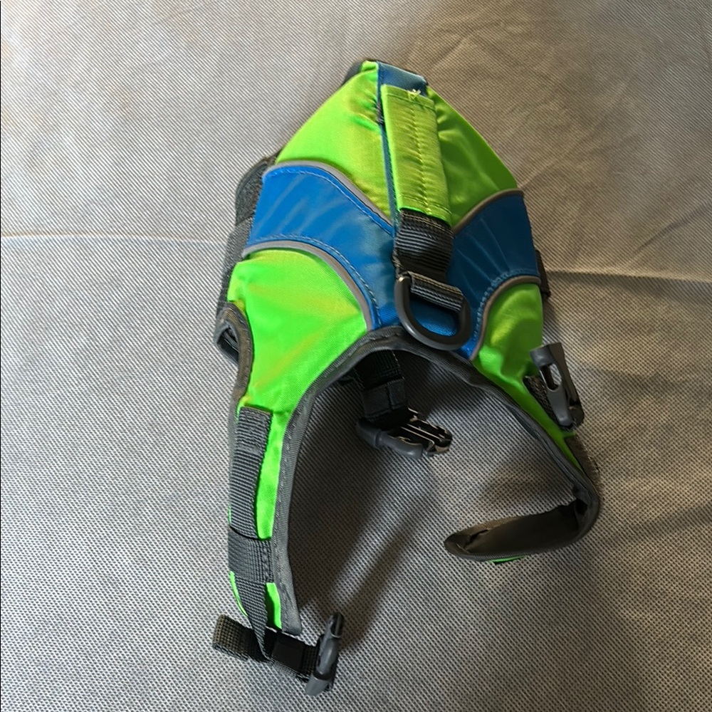 Bright Green and Blue Dog Harness life jacket.